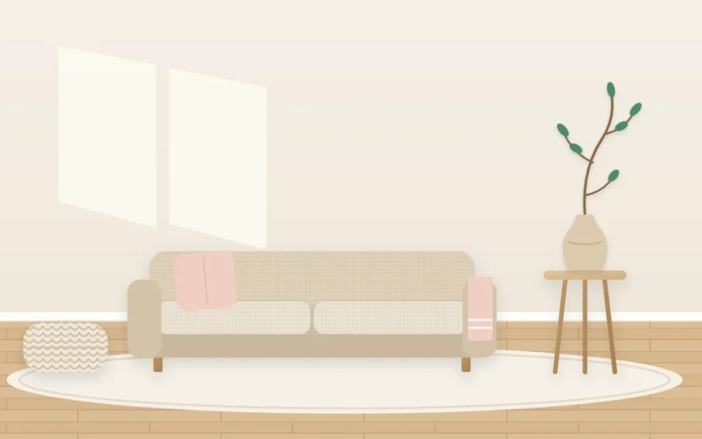 Calm minimalist living room with a low oatmeal linen sofa, a slim wooden side table with one ceramic vase and branch, and a large empty wall