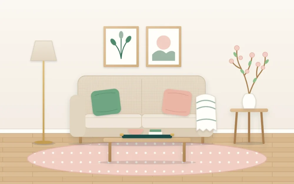 Small sofa corner with green and blush cushions, a light throw, a tray on the coffee table and a vase of spring branches